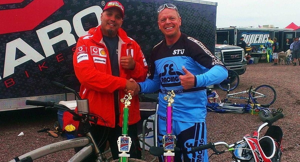 Two men standing next to their SOULFAST EBIKES.