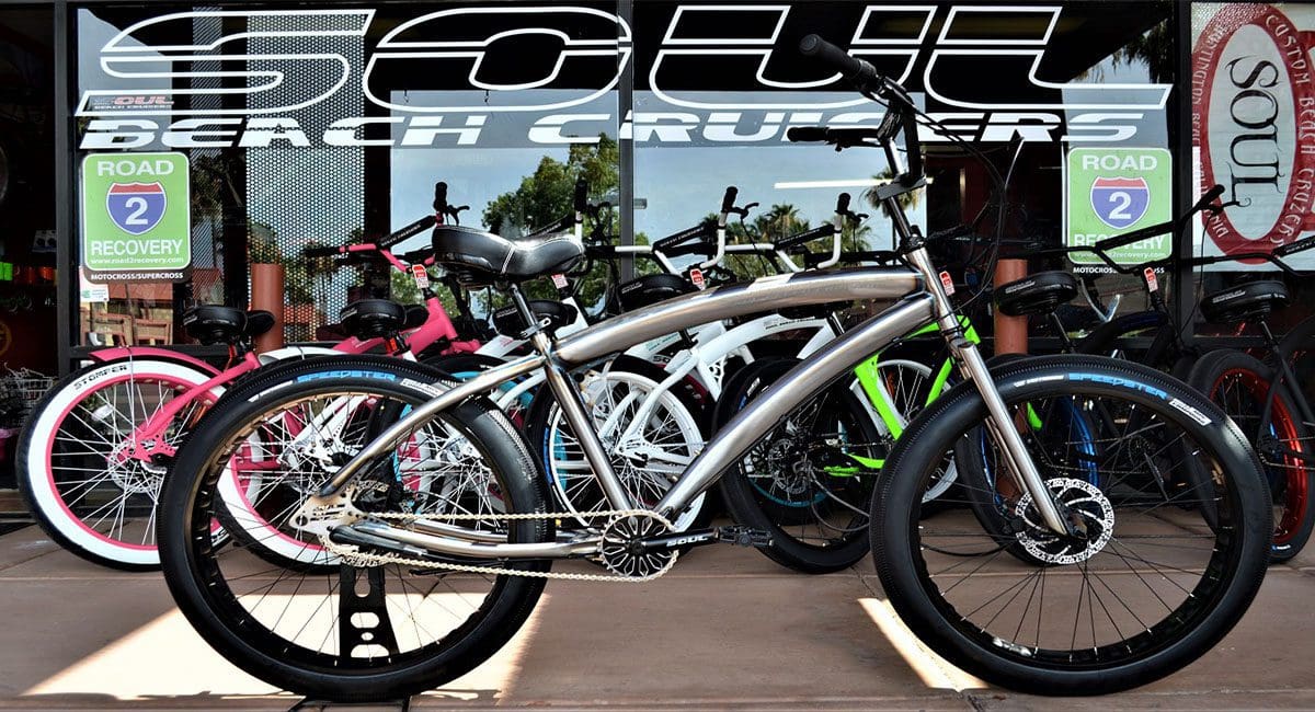 A group of bicycles parked in front of a store.