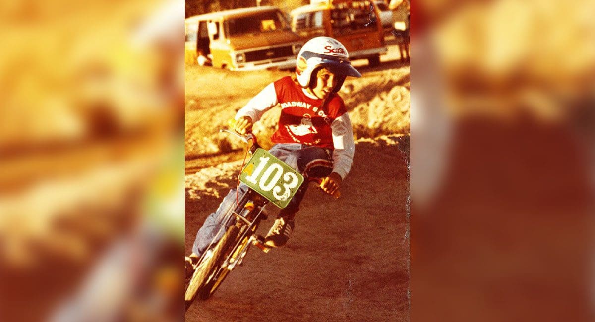 A man riding a SoulFast eBike on a dirt track.