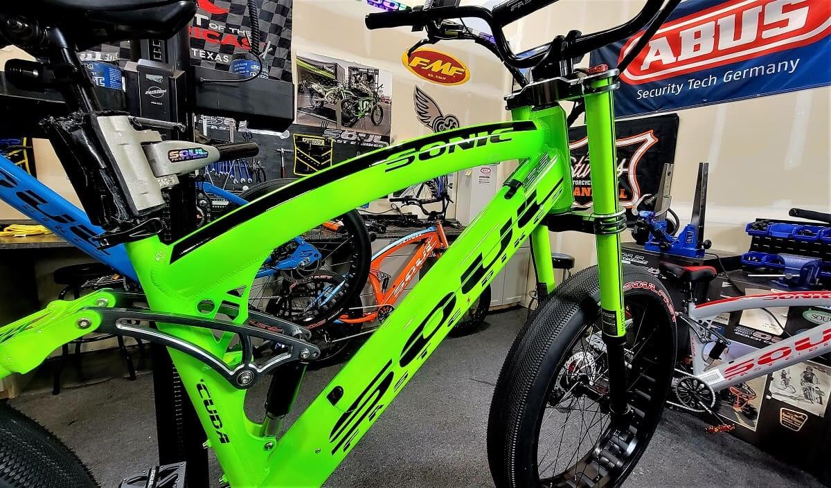 Green BMX bike in a bicycle shop.
