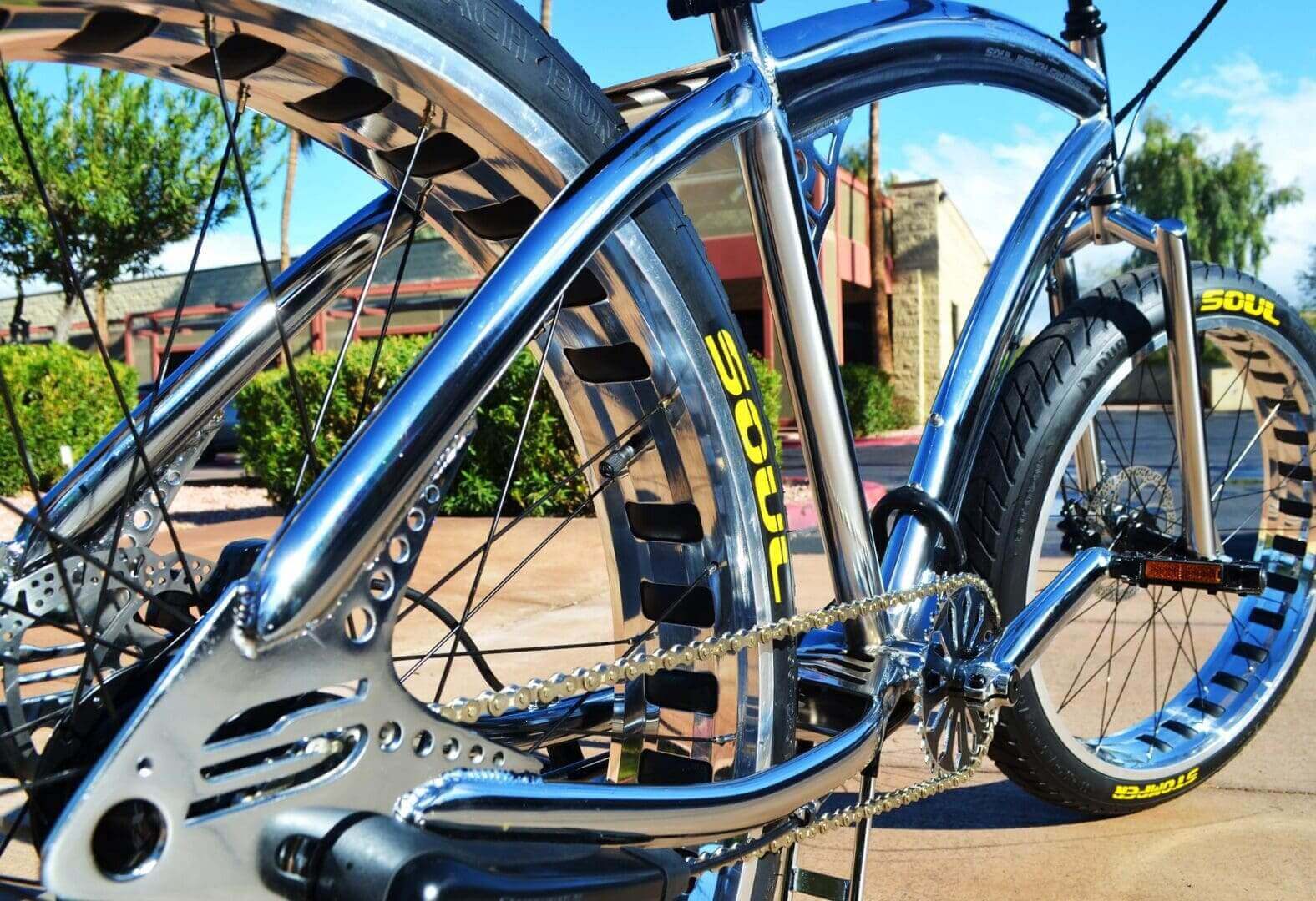 A Soul Stomper - Chrome is parked in front of a building.