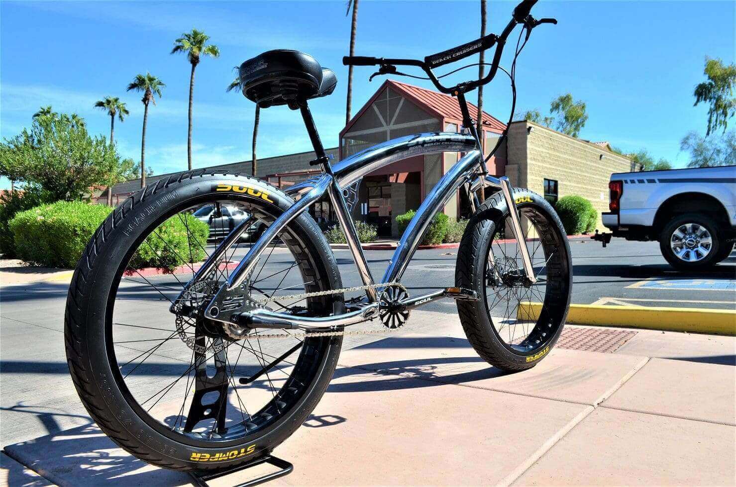 A bike is parked in front of a building.