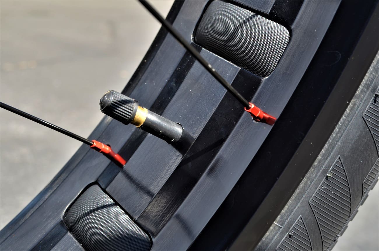 Bicycle wheel with valve and spokes.