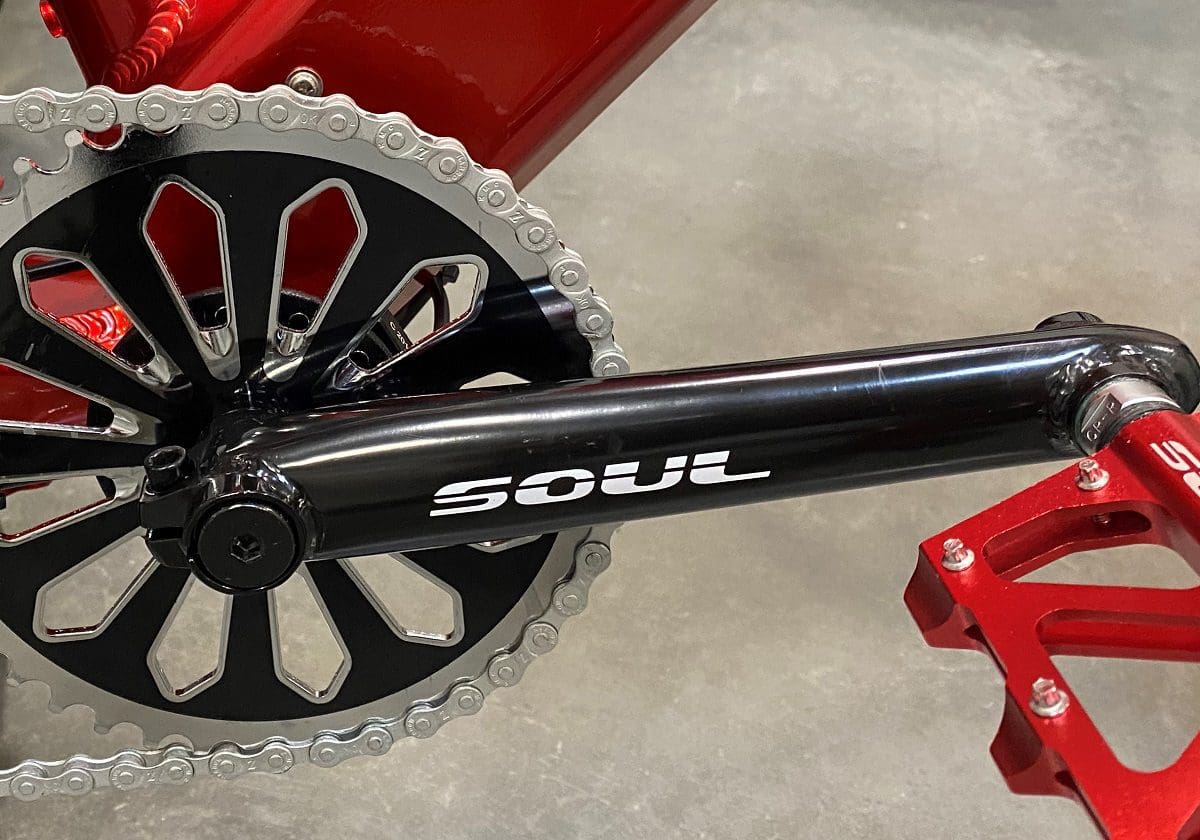 A bicycle with a chain and sprocket on it