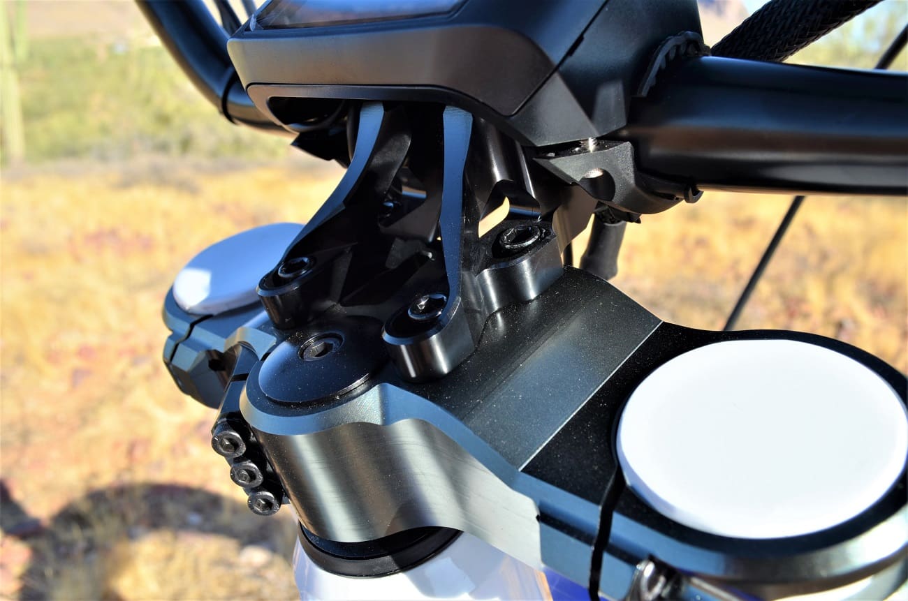 Close-up of motorcycle handlebar and controls.