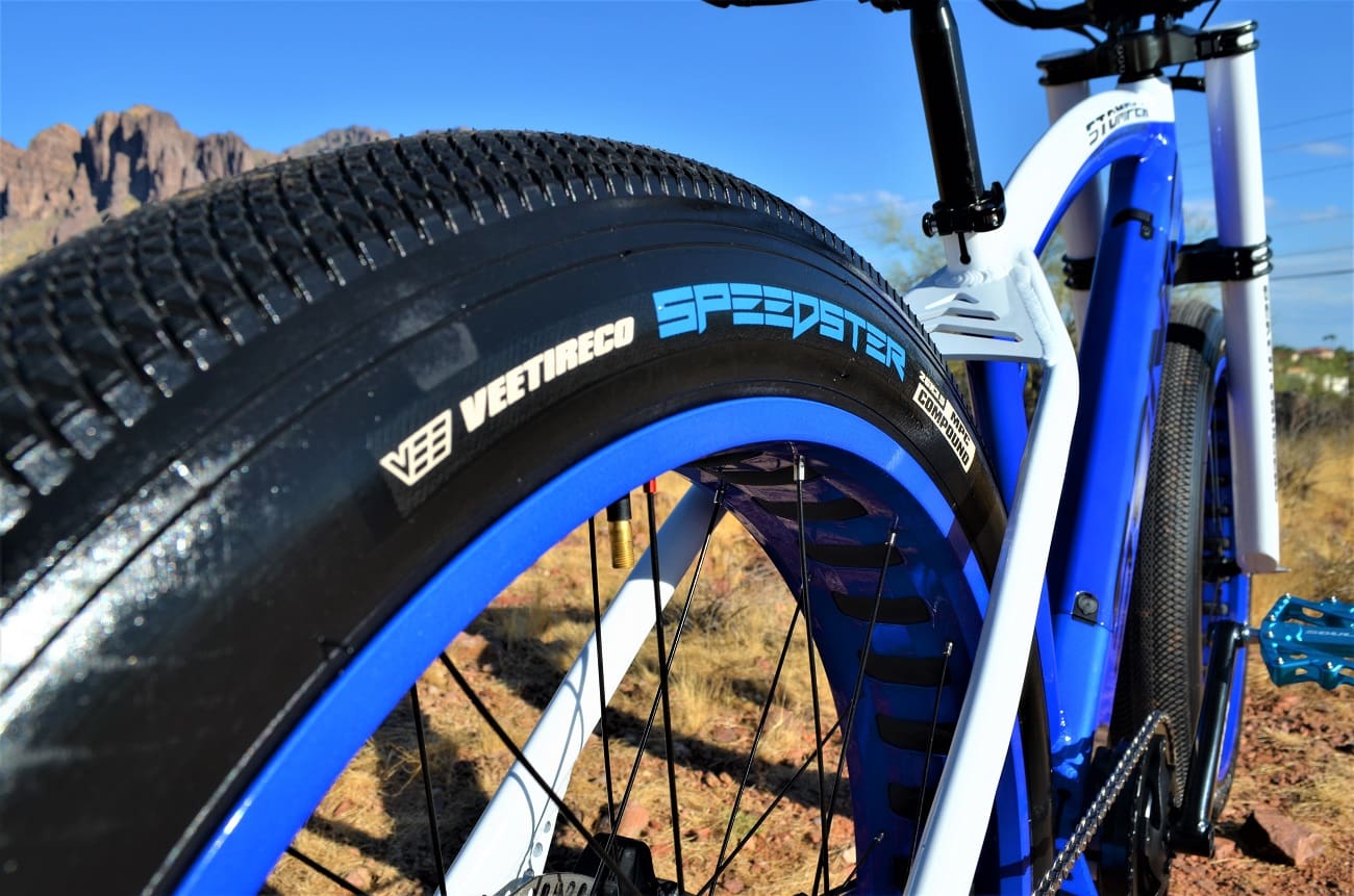 Blue and white bike with Speedster tire.