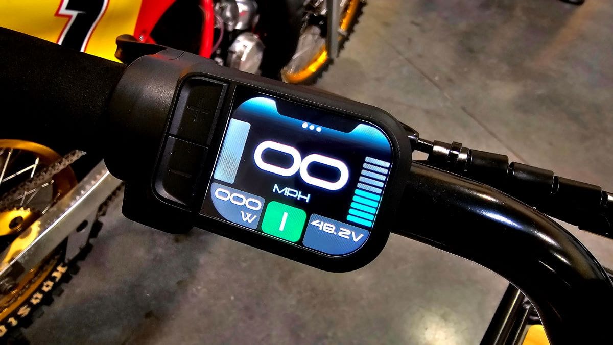 Motorcycle digital speedometer display showing zero mph.