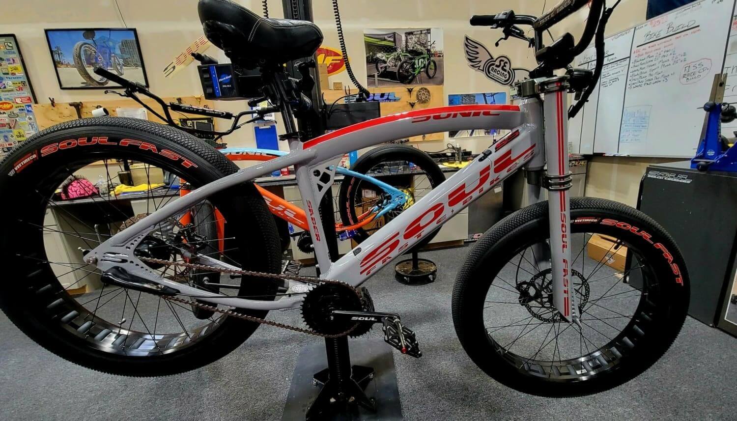 White bike with red and black details.