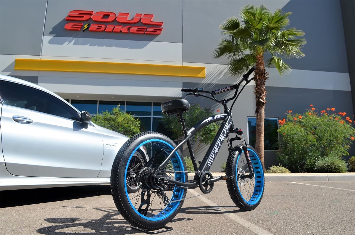 Electric bike parked outside Soul E-Bikes store.
