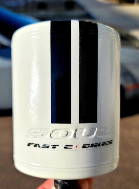 White e-bike head tube with stripe design.