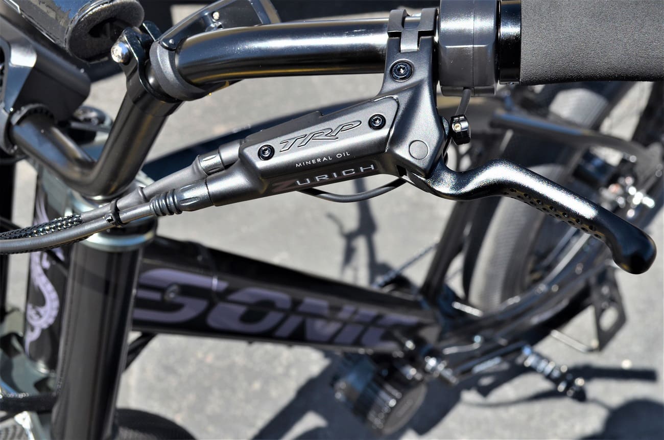 Close-up of bicycle handlebars and brake lever.
