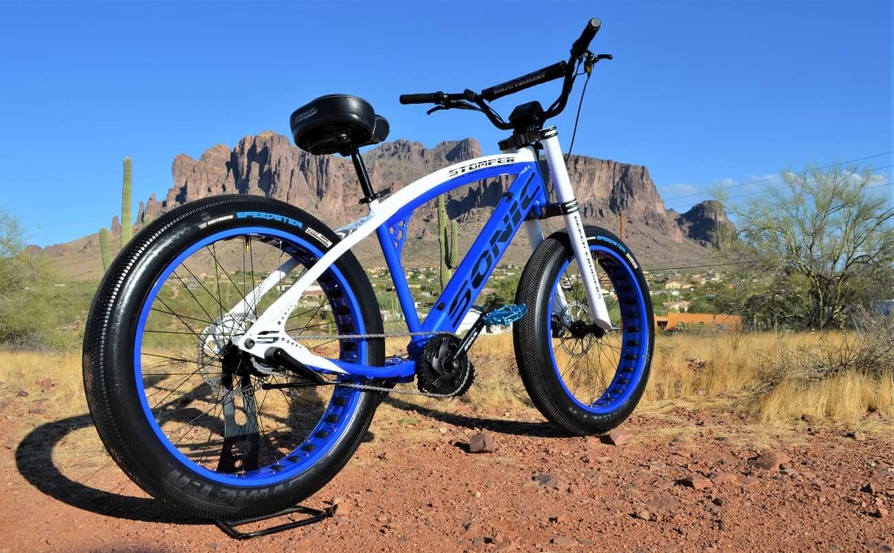 Electric mountain bike in desert landscape.