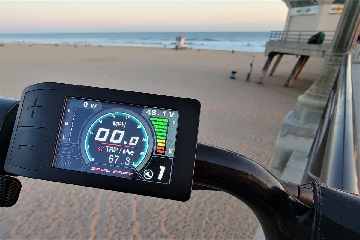 Bicycle speedometer at beachside boardwalk.