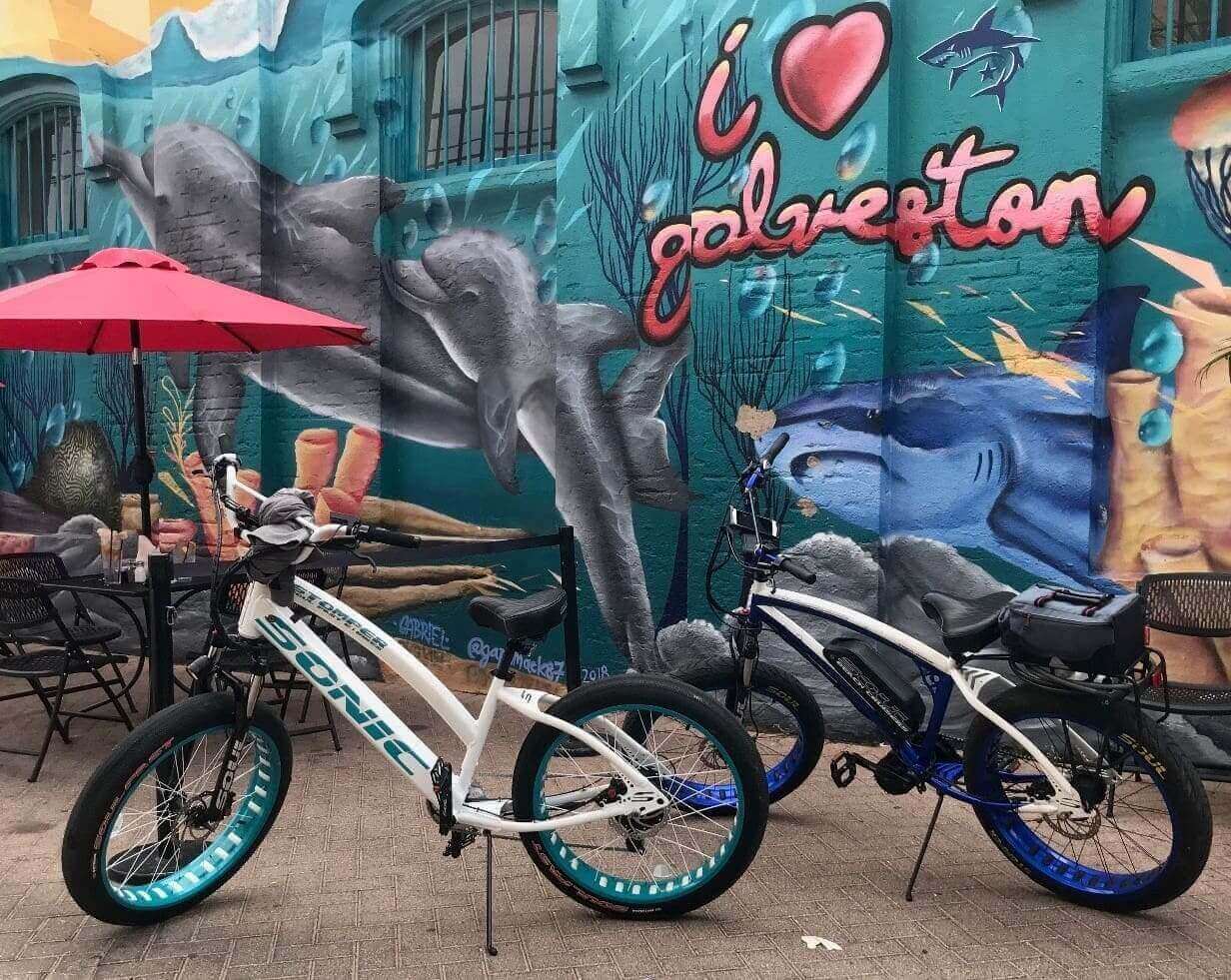 Bicycles in front of Galveston mural.