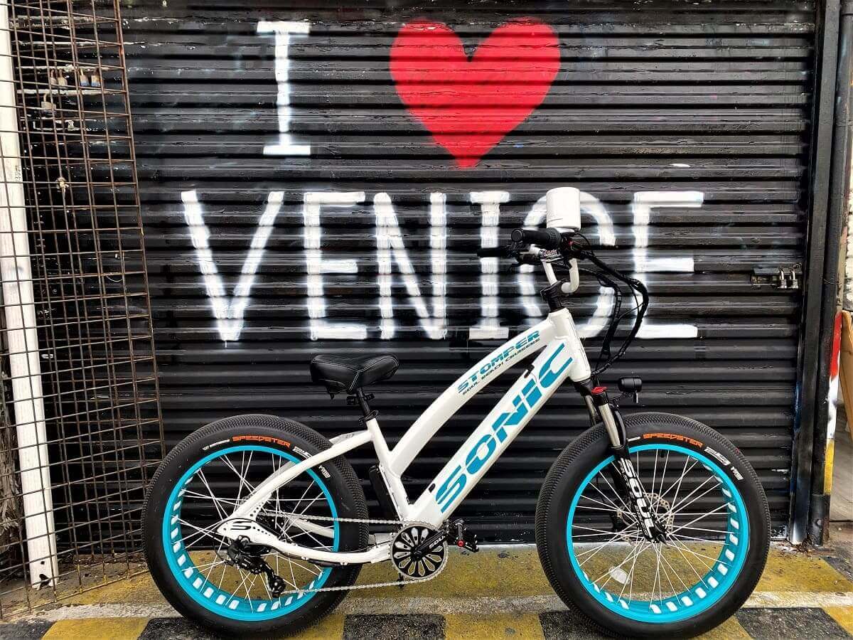 Bicycle in front of "I Love Venice" mural.