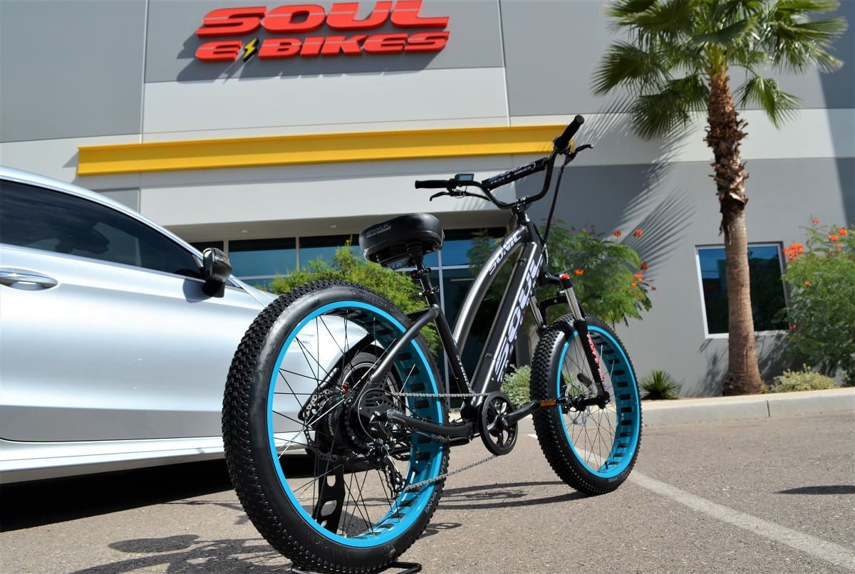 Electric bicycle parked outside Soul Bikes store.