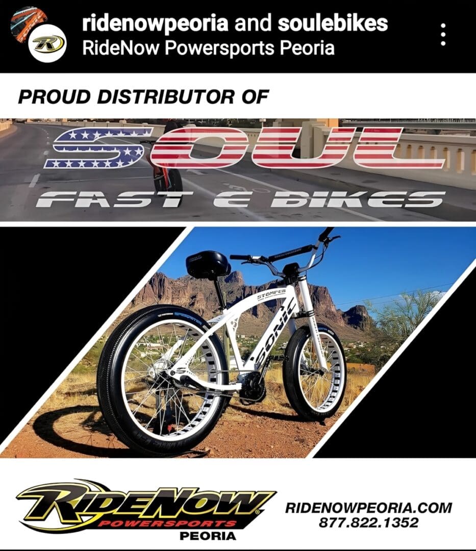 White electric bike on desert background.