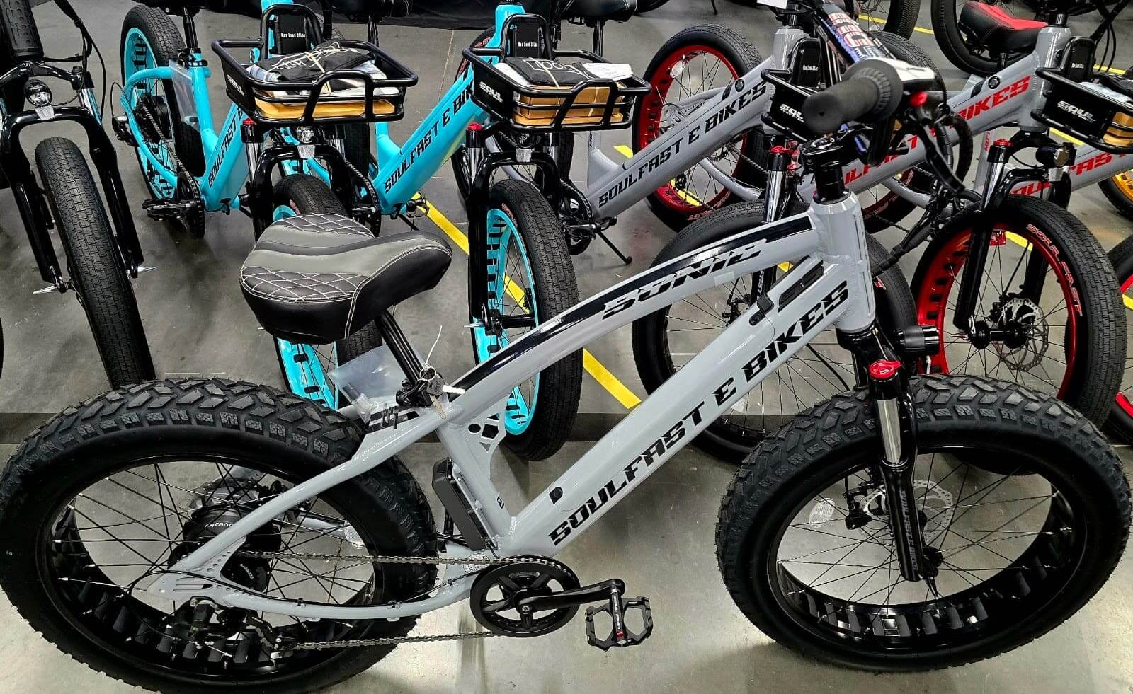Fat-tire electric bikes displayed in store.