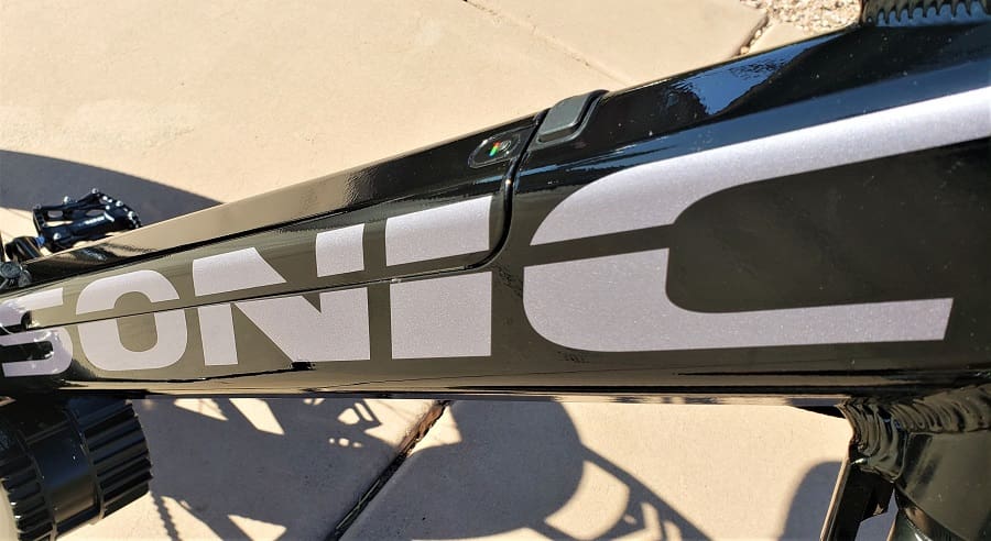 Black bicycle frame with "SONIC" branding.