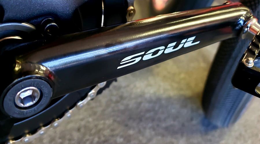 Bicycle crank arm with "Soul" logo.
