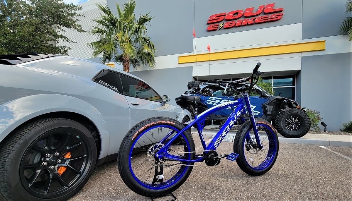 Blue bike outside Soul E Bikes store.
