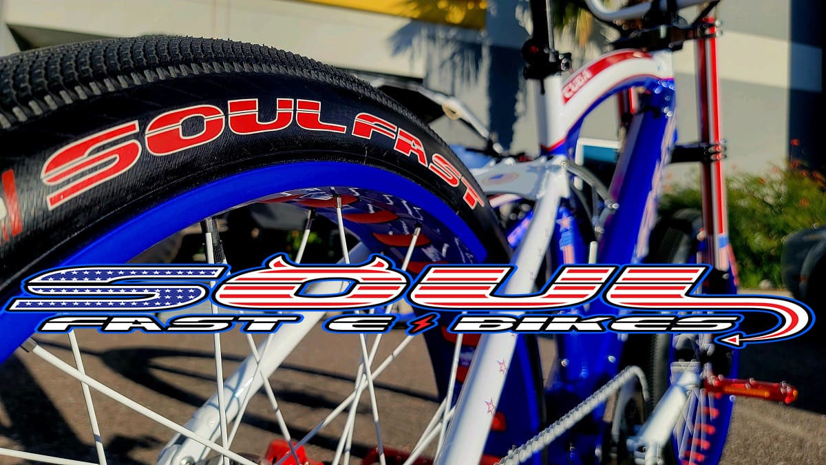 Bicycle with "Soul Fast" tire branding.