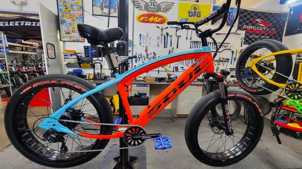 Electric bike with bold red and blue design.