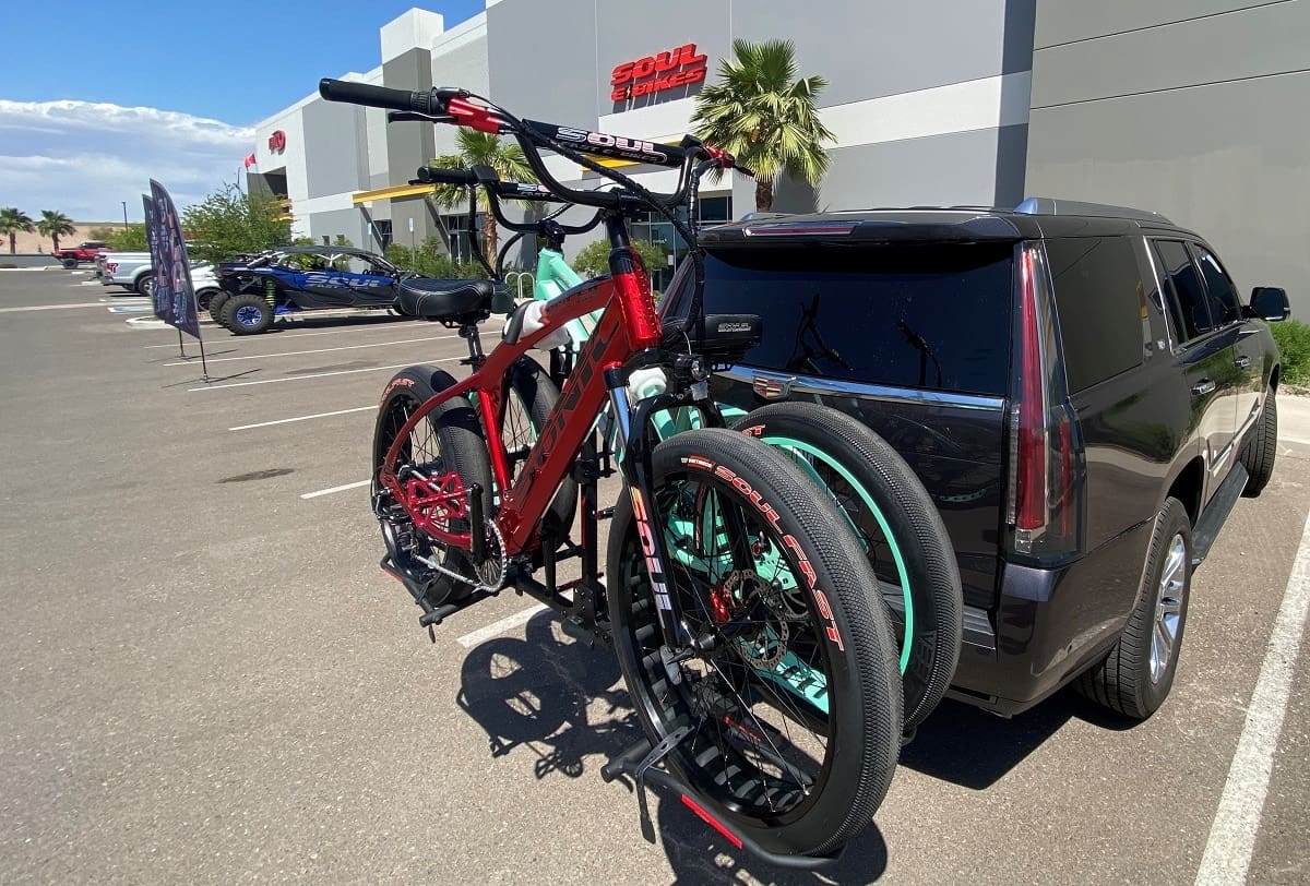SUV with bicycles on rear rack.