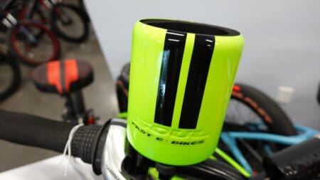 Neon green bike head tube with stripes.