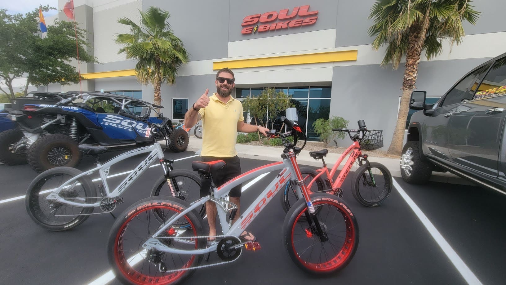 Man with electric bikes outside Soul E Bikes.