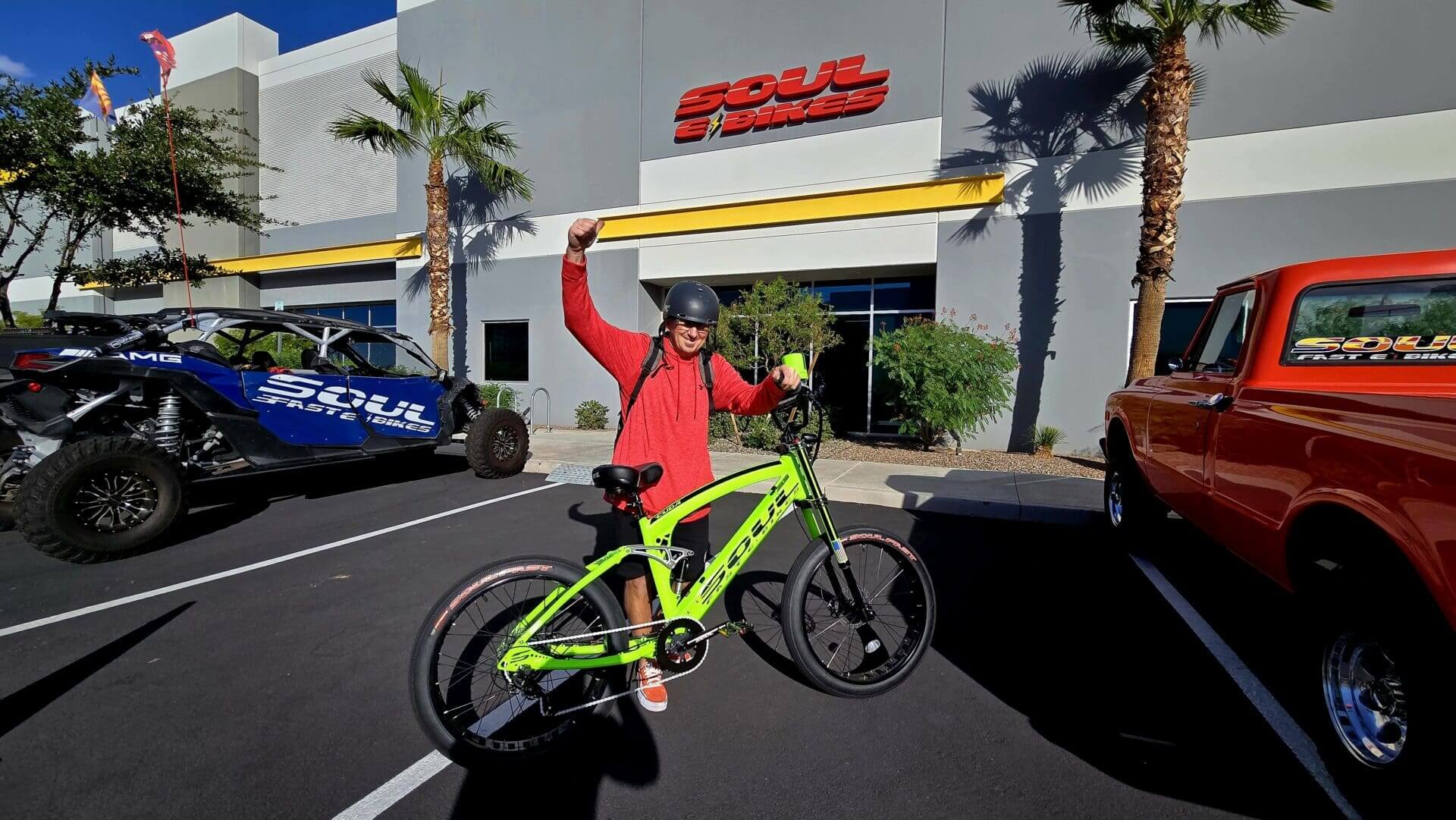 Person with bike outside Soul building.