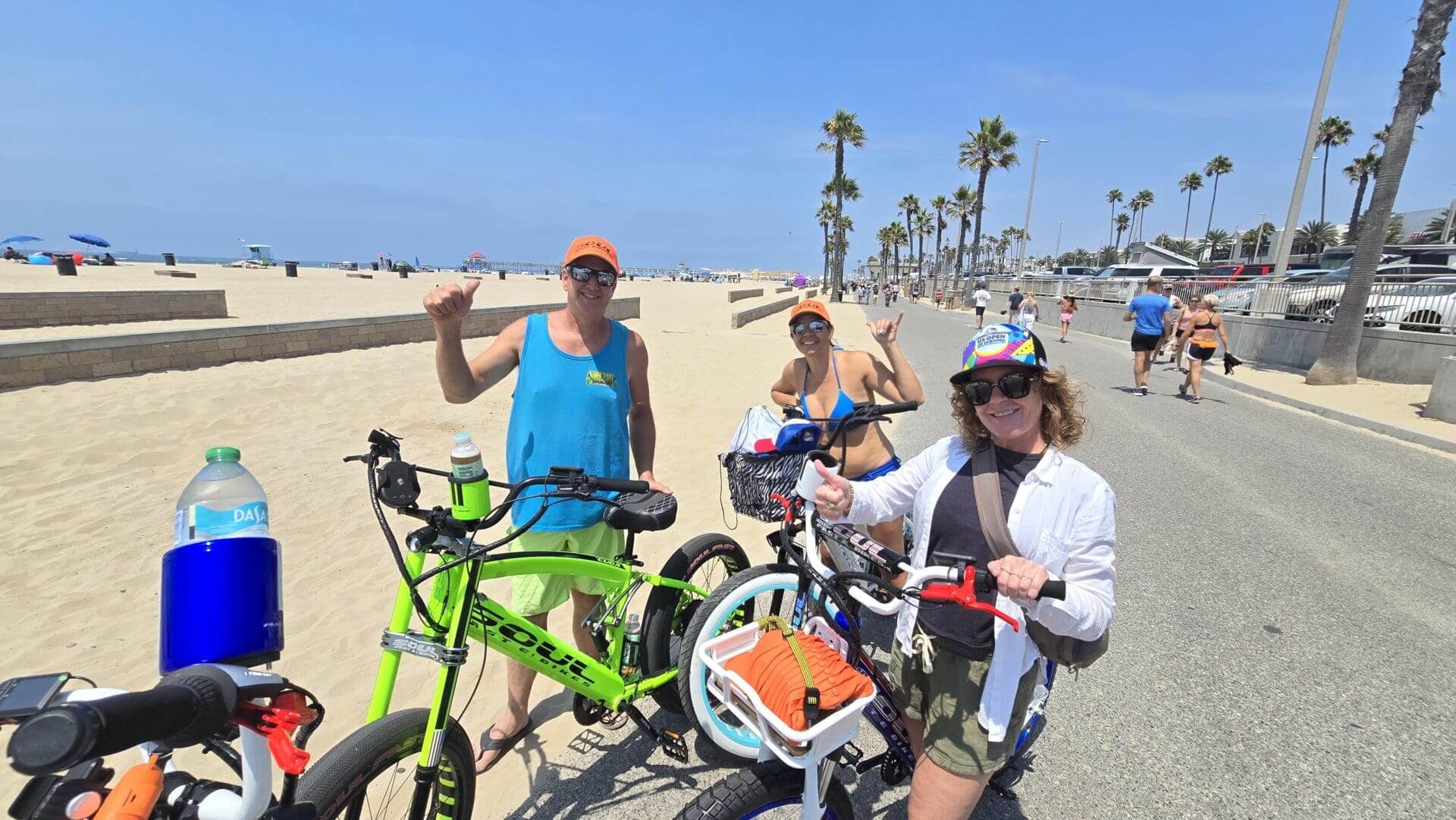 Group enjoying a sunny beach bike ride.