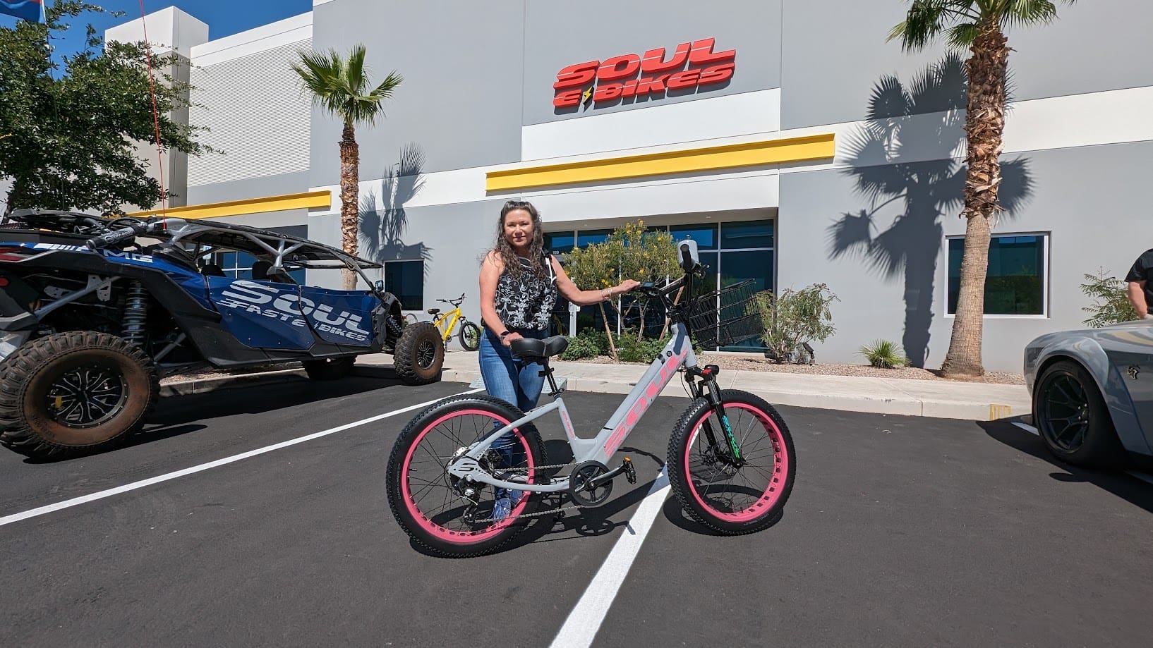 Person with bike outside Soul E Bikes.