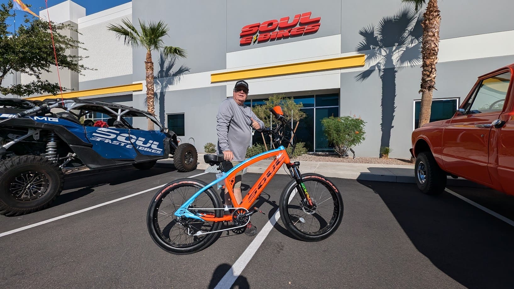 Man with bicycle outside Soul premises building.