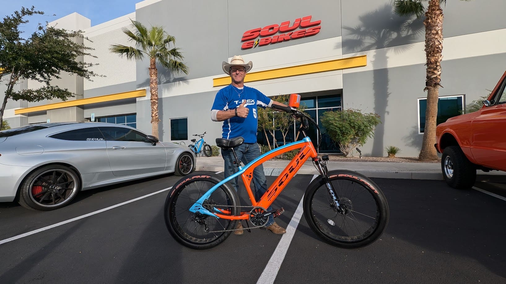 Man posing with bike outside Soul Bicycles.
