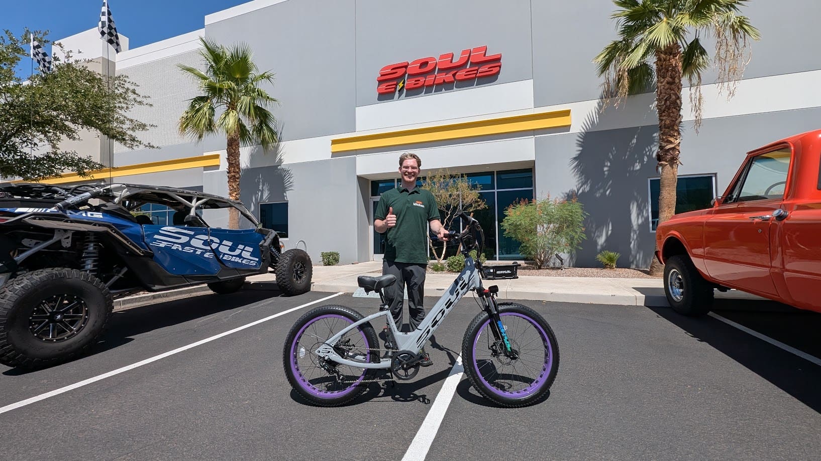 Man with bike outside Soul eBikes building.