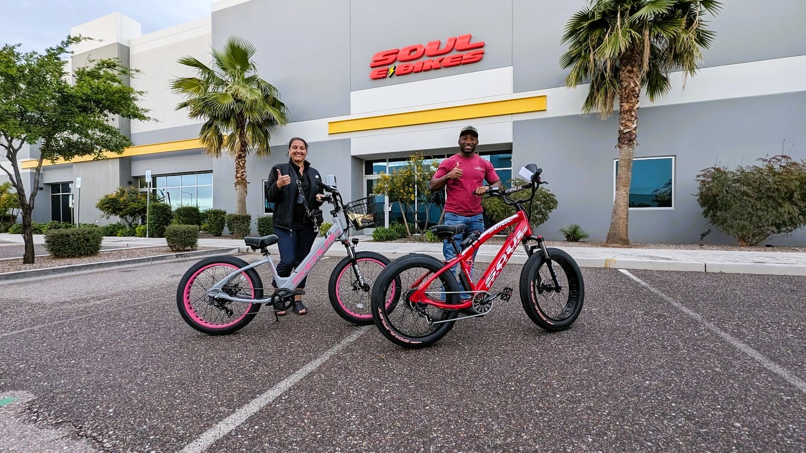 People with bikes outside Soul eBikes store.